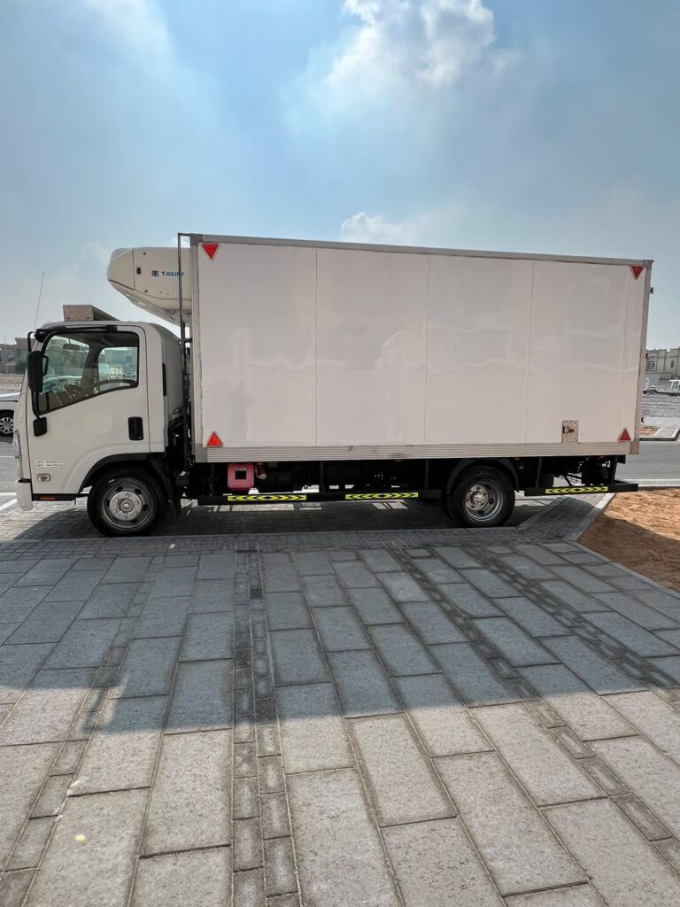 reefer truck parked outdoors for temperature-controlled transport and cold chain deliveries in the UAE.