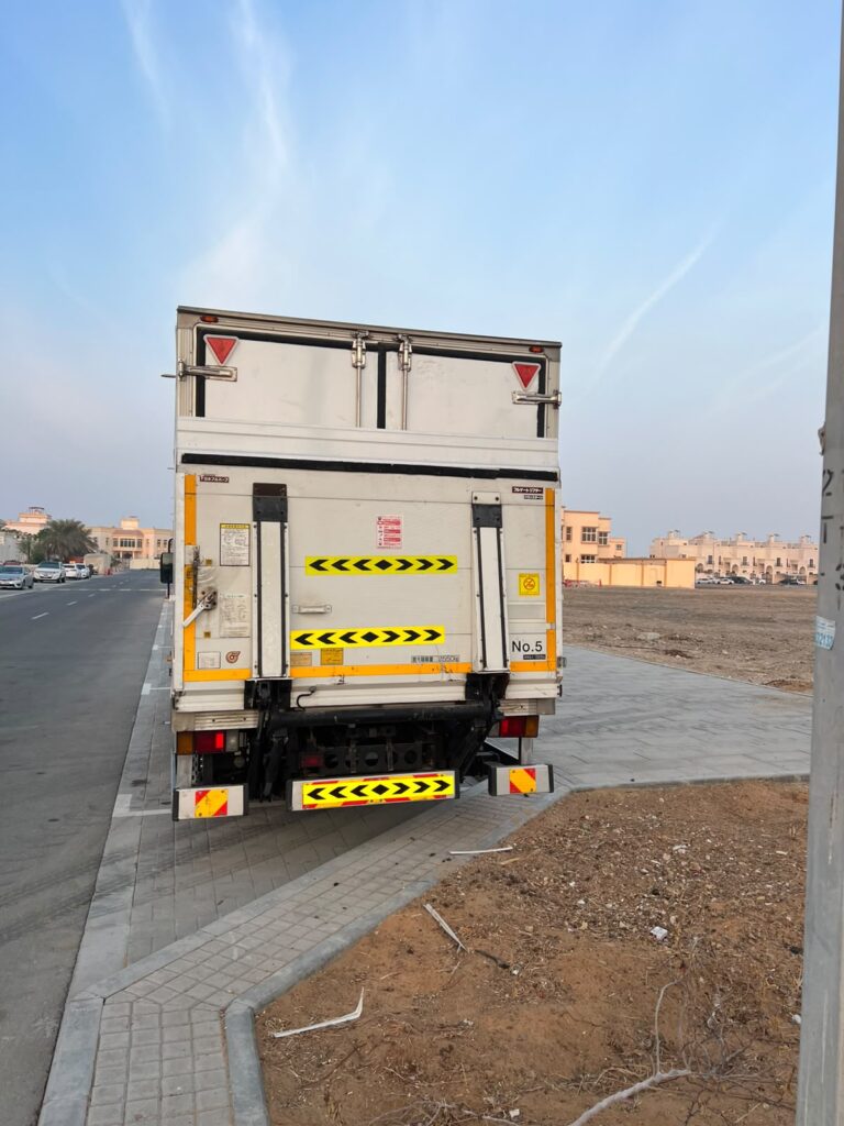 Box truck for cargo transportation and commercial logistics services in the UAE.